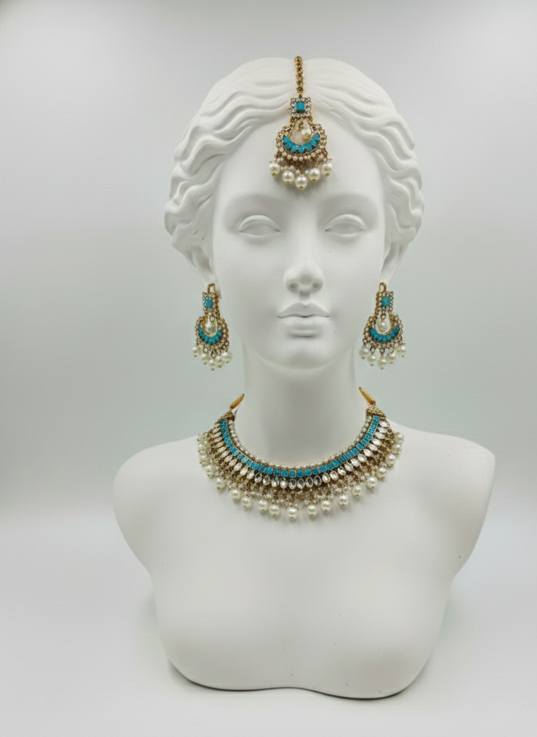Gold‑plated choker set | matching earrings & a stylish maang tikka