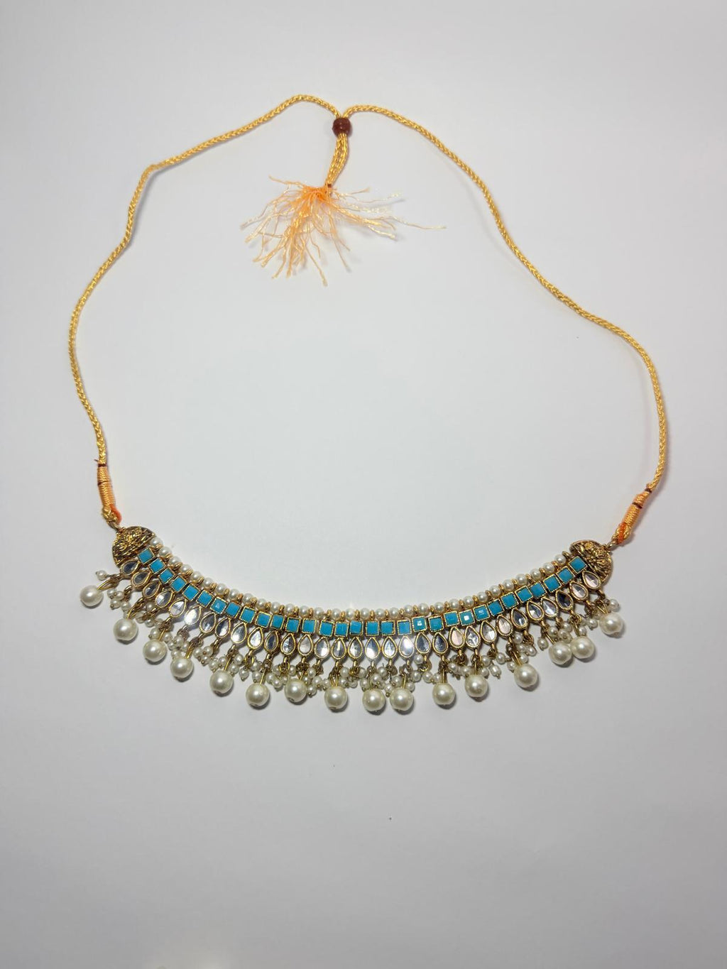 Gold‑plated choker set | matching earrings & a stylish maang tikka