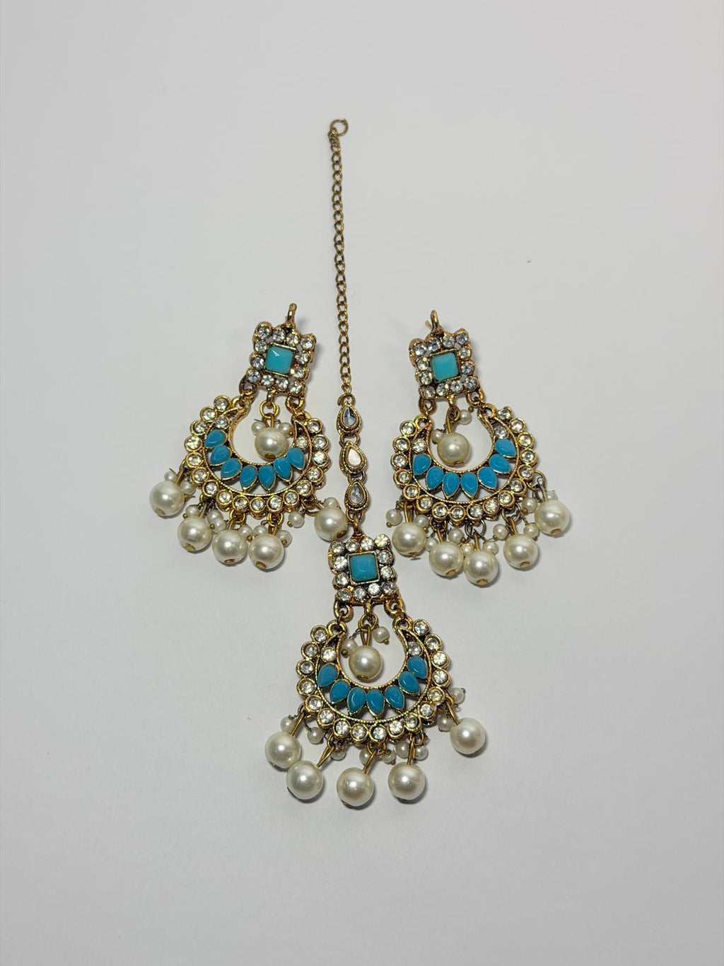 Gold‑plated choker set | matching earrings & a stylish maang tikka