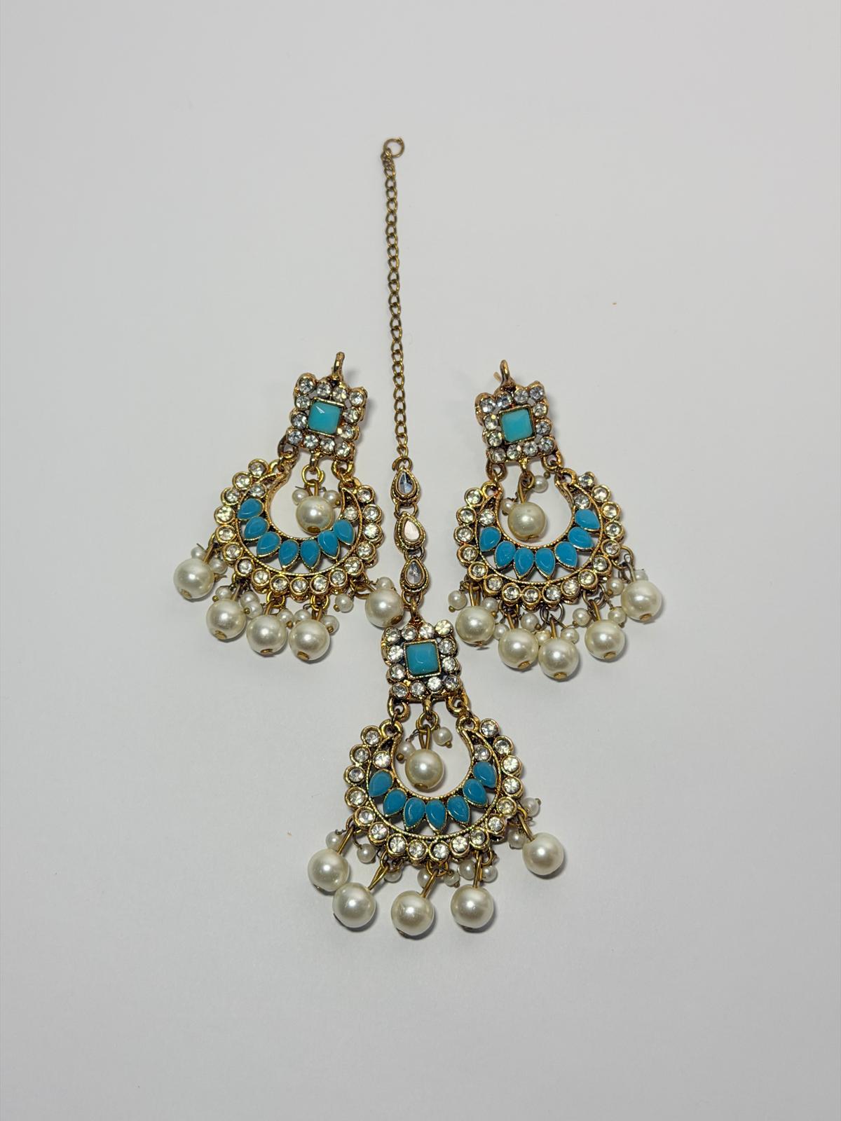 Gold‑plated choker set | matching earrings & a stylish maang tikka