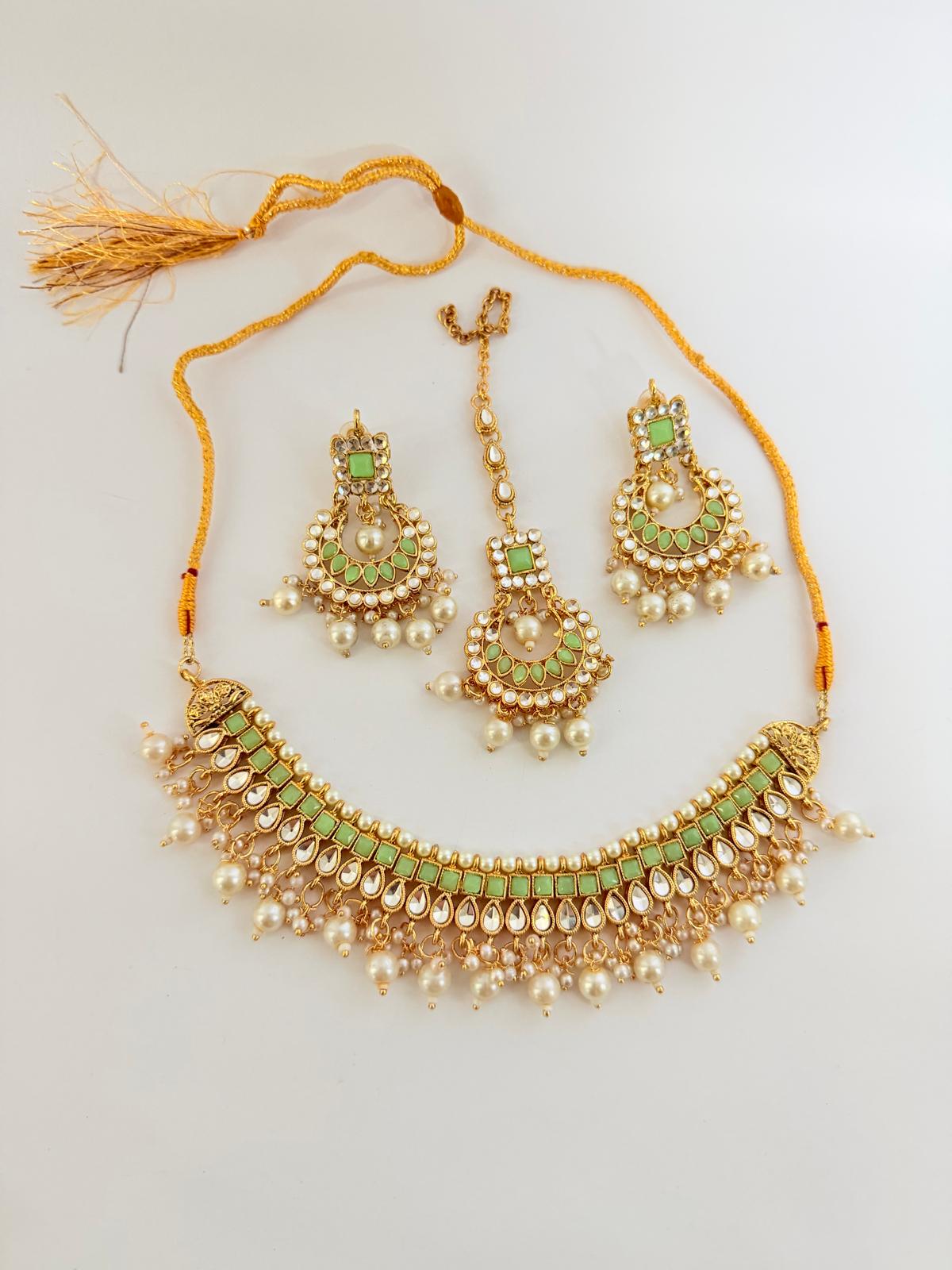 Stunning gold-toned necklace set with mint green stones & pearl