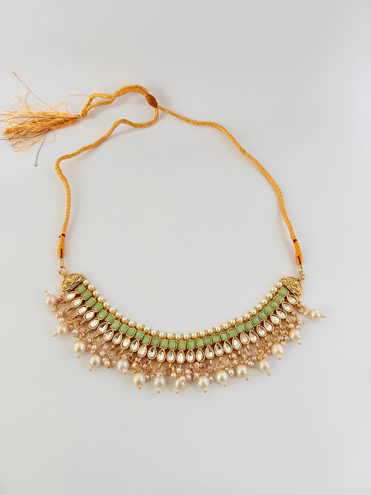 Stunning gold-toned necklace set with mint green stones & pearl
