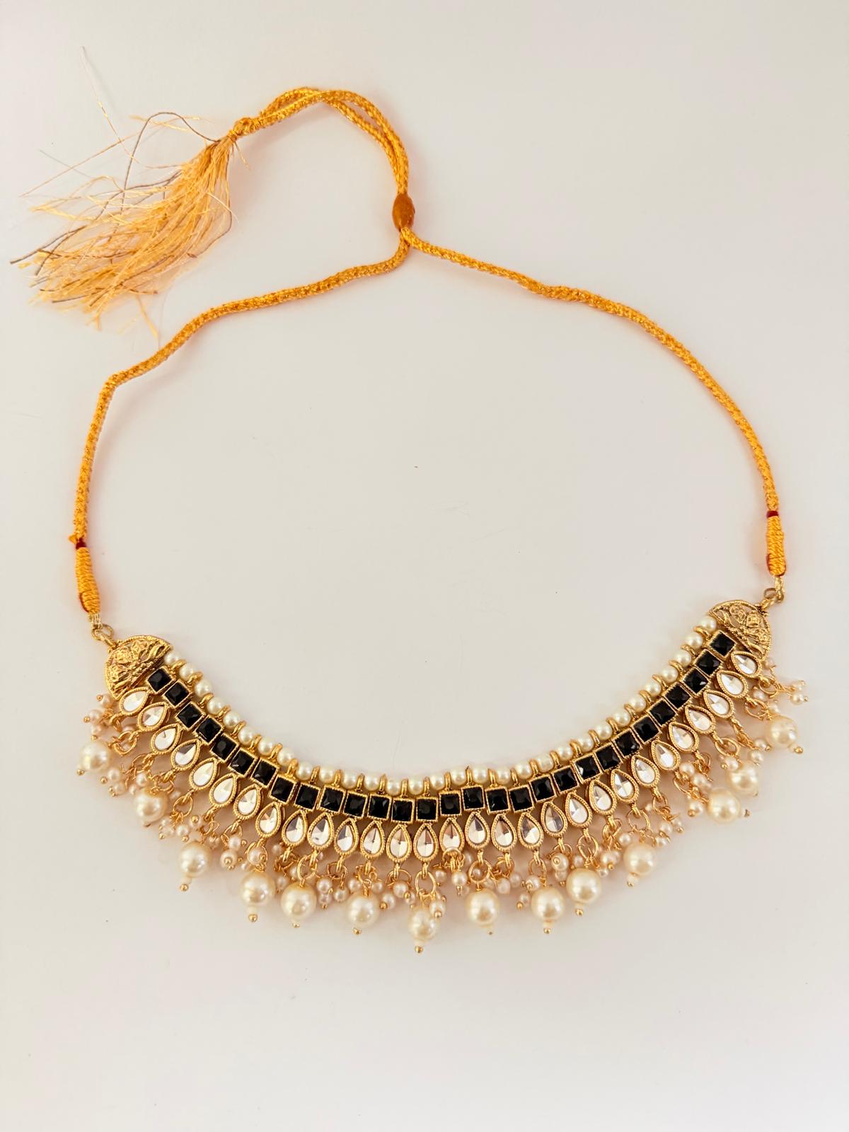 Elegant Black &amp |Gold Kundan Jewelry Set.