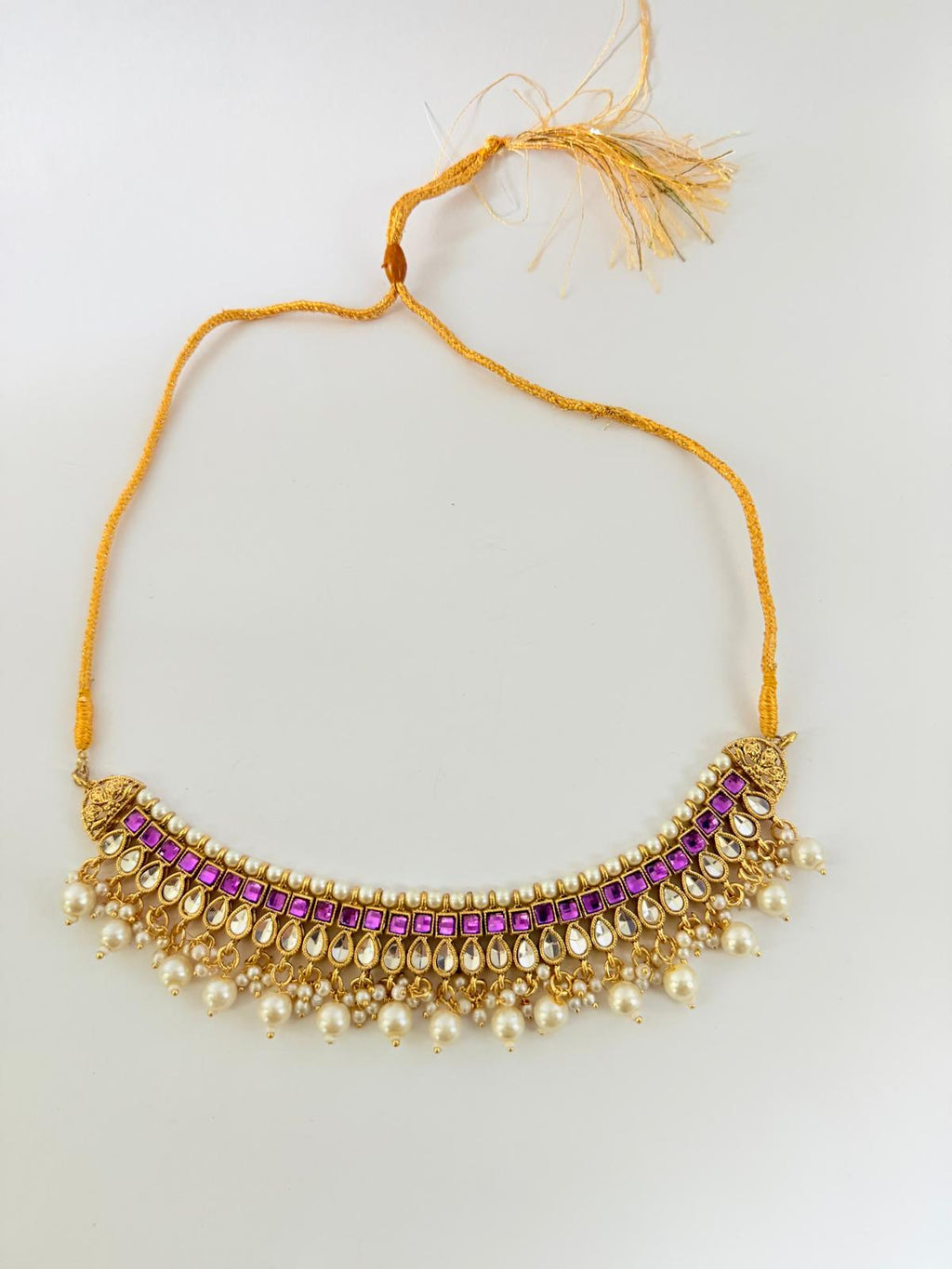 Stunning gold-toned choker necklace set with purple & pearl accents