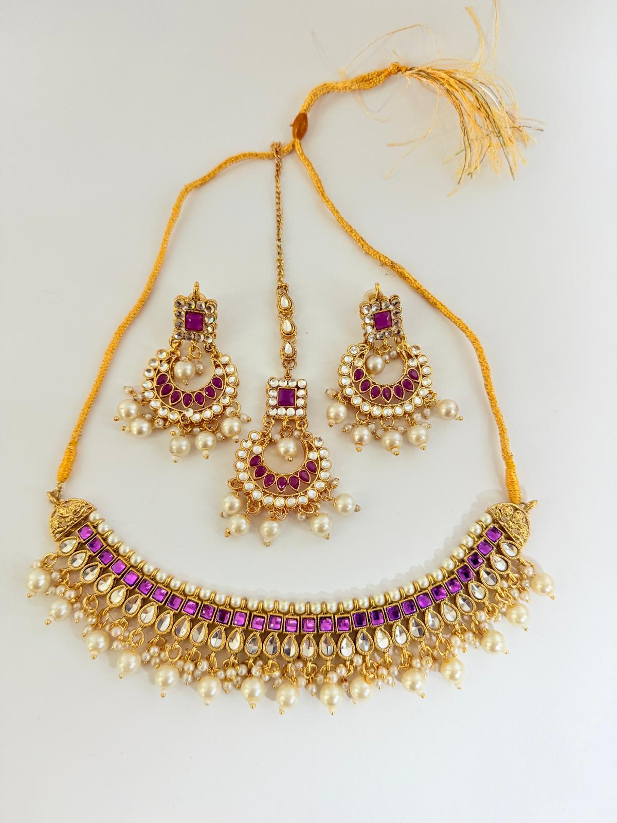 Stunning gold-toned choker necklace set with purple & pearl accents