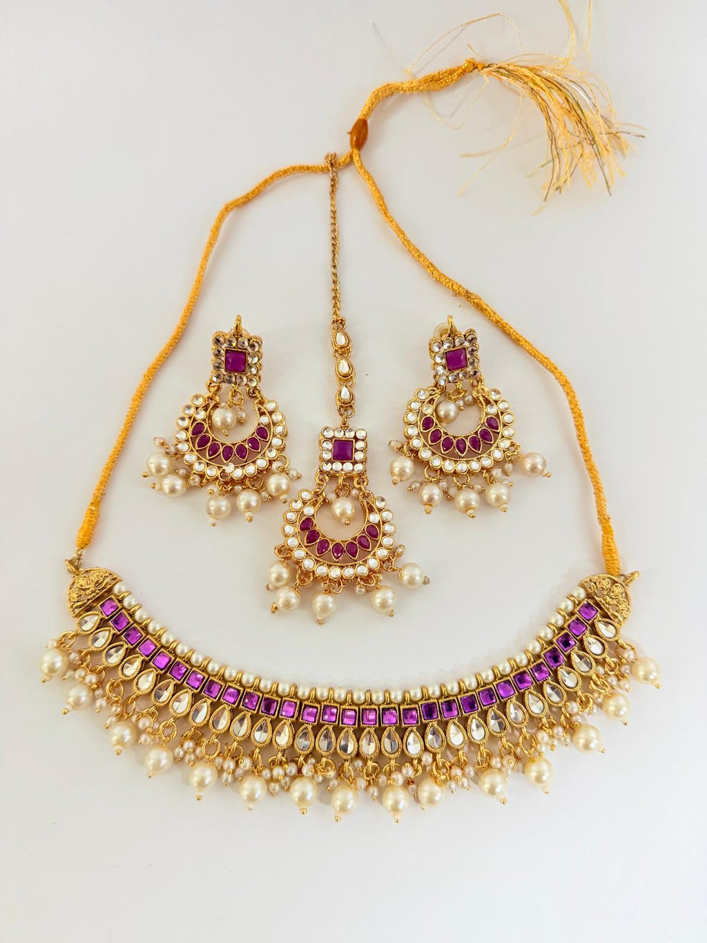 Stunning gold-toned choker necklace set with purple & pearl accents