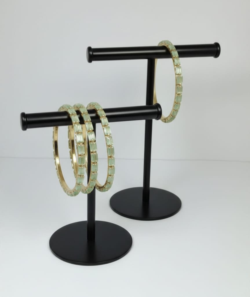 Stunning mint‑green crystal bangles set in gold‑tone metal