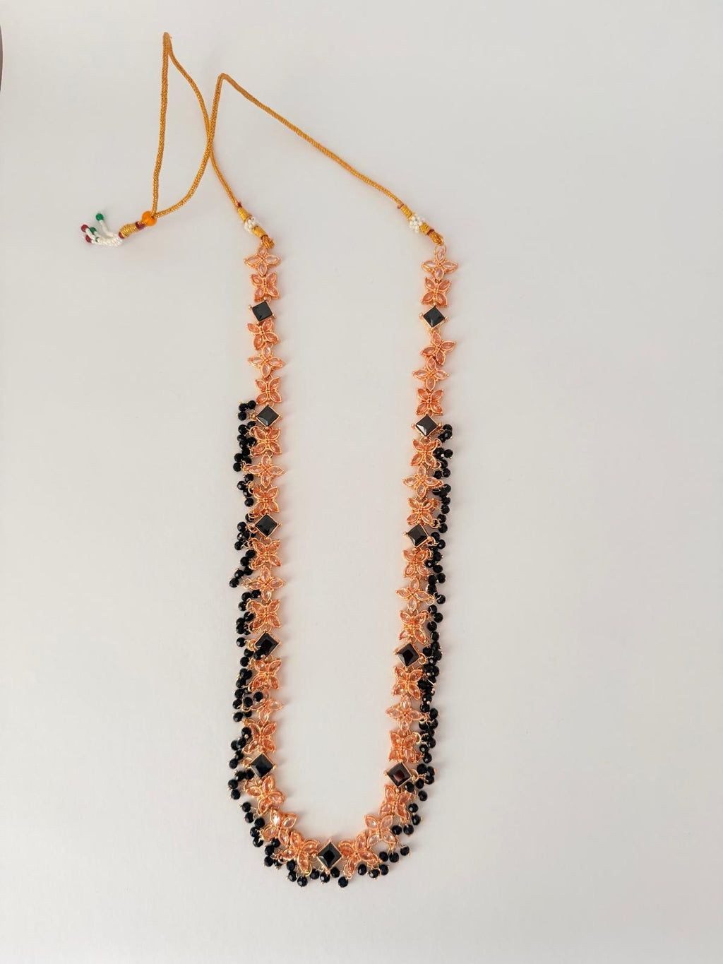 Stunning rose‑gold necklace set with black stone accents