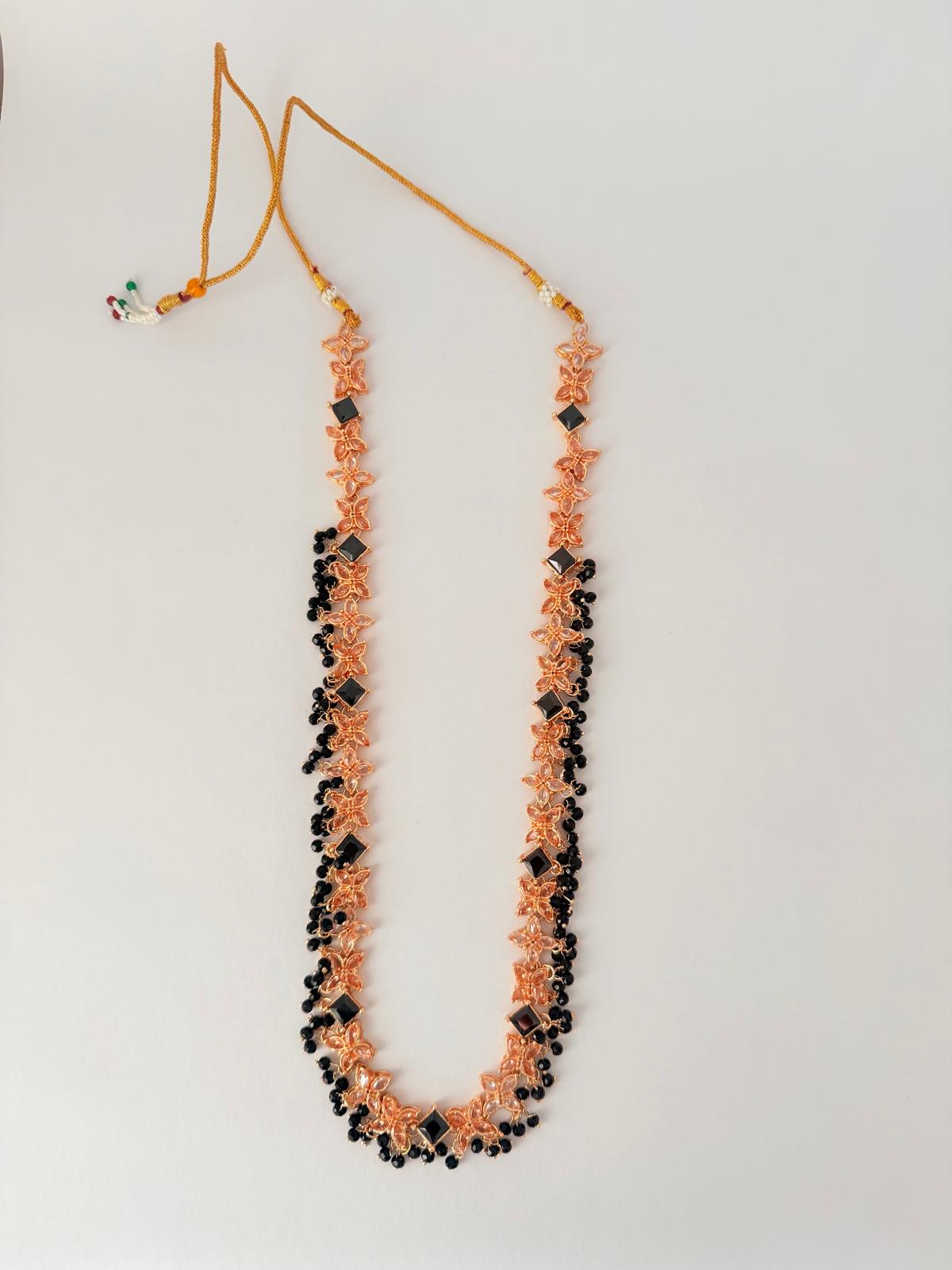Stunning rose‑gold necklace set with black stone accents