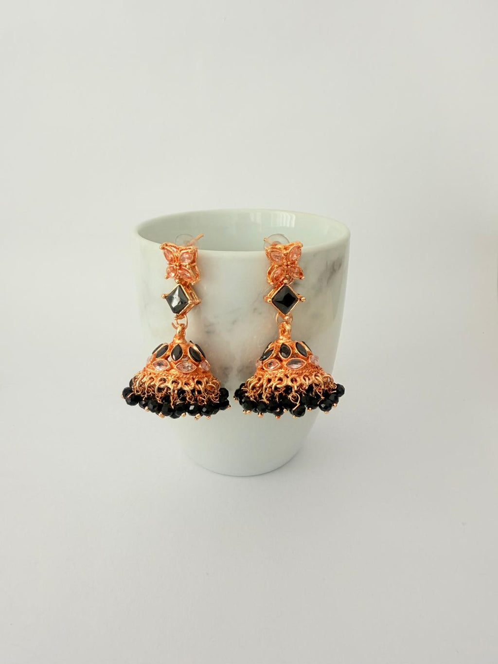 Stunning rose‑gold necklace set with black stone accents