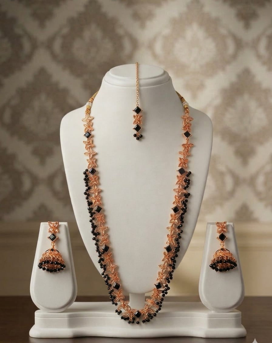 Stunning rose‑gold necklace set with black stone accents