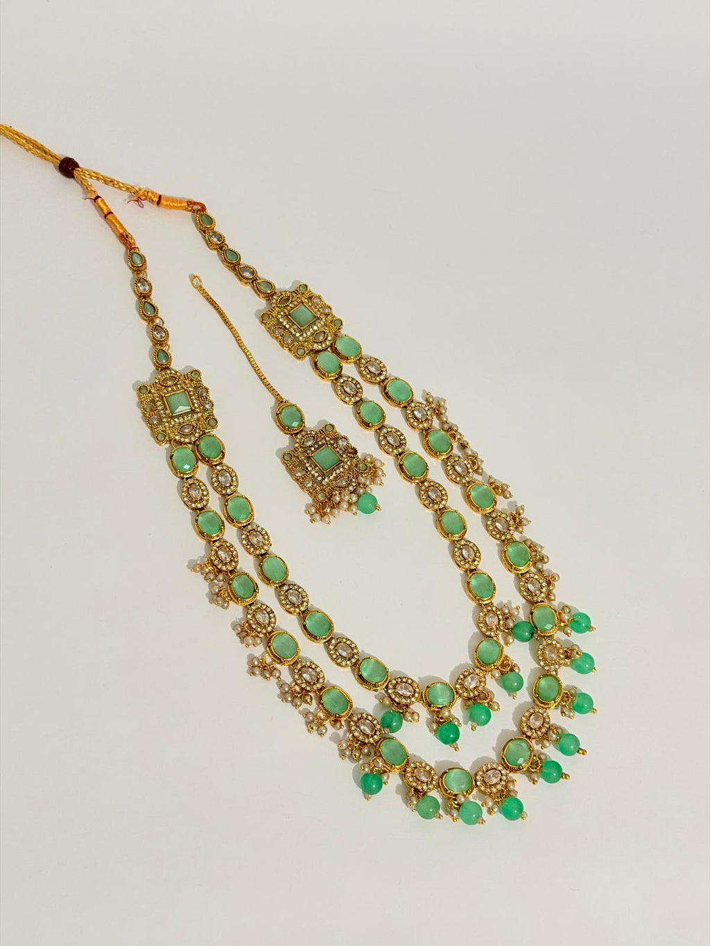 ✨ Stunning gold-toned necklace & earring set with vibrant mint-green stones & pearls ✨