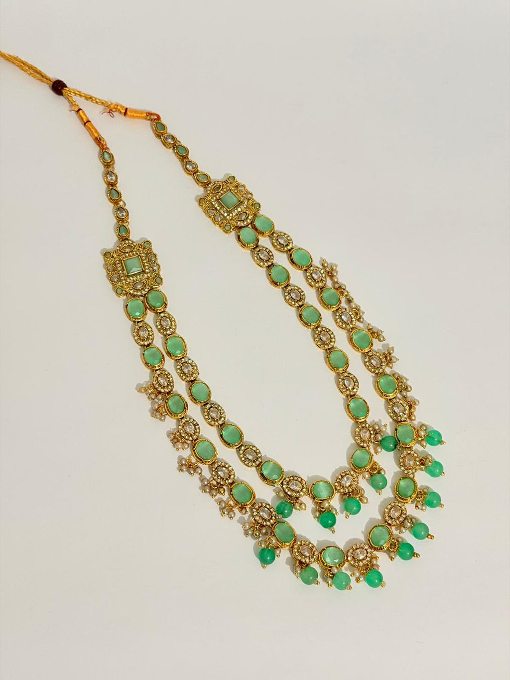 ✨ Stunning gold-toned necklace & earring set with vibrant mint-green stones & pearls ✨